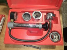 Snap-on Cooling System Tester with a Selection of Extra Adapters