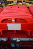 *Row of Red Plastic Barriers