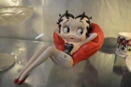 Betty Boop Figure Reclining on a Heart Cushion