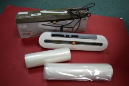 Vacuum Food Sealer and 2x Rolls of Bags