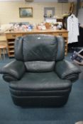 Green Leather Reclining Armchair on Swivel Base (required Cleaning