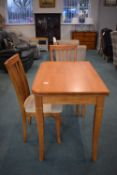 Folding Swivel Top Dining Table and Two Chairs with Upholstered Seats