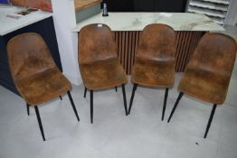 *Set of Four Distressed Faux Leather Dining Chairs on Tapered Legs