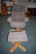Grey Upholstered Swivel Armchair and Footrest