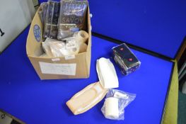 Mixed Lot Including Makeup Bands, Sports Tape, and DVDs