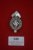 National Socialist organisation badge, circular pierced alloy example with central swastika and