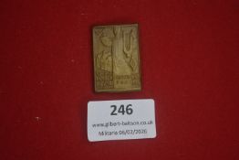 German Sängerbund festival badge, rectangular form depicting a robed figure with cityscape,