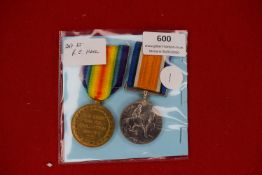 Pair of First World War medals comprising 1914–15 Star and Victory Medal, the former impressed to