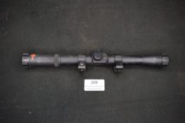 OS Mk 4×20 rifle scope, finished in black, complete with mounting brackets. Showing minor cosmetic