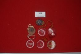 A small group of German novelty and decorative pendants, comprising translucent plastic and