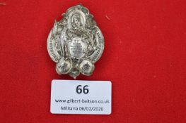 German religious association badge, ornate oval form with central Christogram and flanking