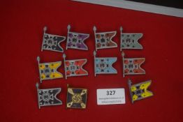 A group of German political flag badges, flag form on staffs, in various colour combinations with