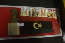 A mixed Third Reich–period display group, comprising a small bronze-tone bust of a German soldier