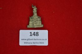 German monument commemorative tinnie, cast in the form of the Niederwalddenkmal statue, with