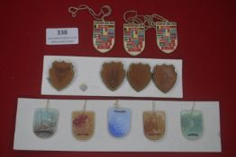 A mixed group of German souvenir and event badges, including Europa-Zug 1951 shield-shaped