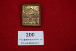 German commemorative badge, rectangular brass example depicting mountainous landscape, inscribed