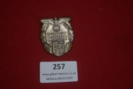 German regional commemorative badge, oval wreath enclosing heraldic shield and eagle, inscribed “