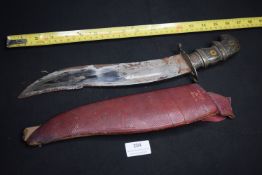 Curved short sword or kukri-type knife, likely South or Southeast Asian, with broad curved blade