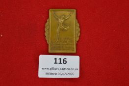 German workers’ sports commemorative badge, rectangular bronze plaque depicting leaping athlete,