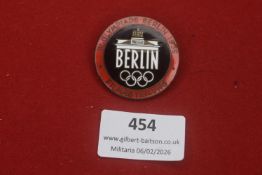 1936 Berlin Olympic Games “Filmartellung” badge, circular enamelled example depicting the