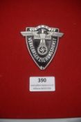 A Third Reich NSKK Verkehrserziehungsdienst (Traffic Education Service) badge, shield-shaped