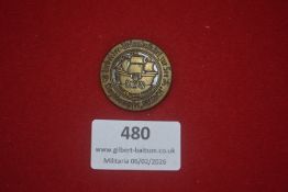 German Third Reich Kraft durch Freude commemorative badge, dated 1934, depicting a sailing ship