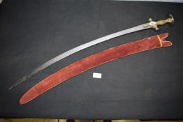 Curved single-edged sword, likely Middle Eastern or North African, with plain steel blade showing
