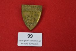 German civic or historical commemorative badge, shield-shaped depicting castle or townscape,