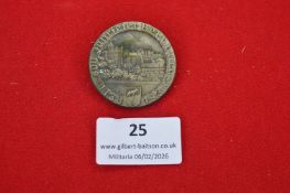 German Bernburg commemorative badge, circular bronze-toned example depicting townscape and arms,