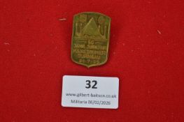 German Karlsruher Turngau commemorative badge, shield-shaped bronze-toned example depicting