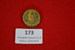 German commemorative badge featuring a portrait bust within a circular wreath border, inscribed “Der