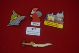 Three German WHW carved wooden plaques, including examples marked WHW 34, Mit R.D.R. zum Rhein,