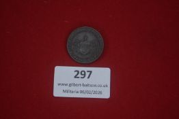 German patriotic round badge in dark metal, with central shield and surrounding inscription “Was die