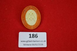 German factory or workforce badge by Leipziger Frühjahrsmesse 1936, oval plastic construction with