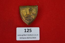 German regional commemorative badge, shield-shaped bronze issue depicting uniformed figure with