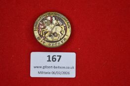 German patriotic commemorative tinnie, circular form depicting a mounted rider with lance, with