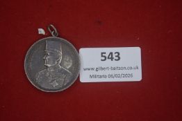 First World War commemorative medal, circular silvered example depicting a charging infantryman,