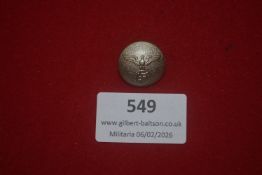 German uniform button, pebble-finished silvered example bearing an eagle above a swastika.