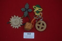 A small mixed group of German decorative folk items, including a lace edelweiss-style rosette,