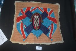An embroidered ceremonial or decorative textile panel, possibly theatrical or regimental in