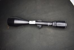 Bushnell Sportview rifle scope, variable magnification, finished in black. With clear lenses and