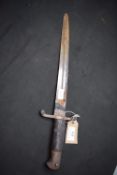 German Imperial period bayonet, sawback-less single-edged blade with broad fuller, ribbed black grip