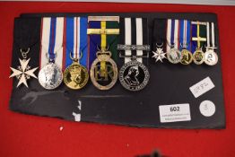 Royal Victorian Order and associated medals group, comprising neck badge (silver-gilt and enamel),