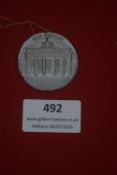 German Third Reich souvenir medallion, circular, depicting the Brandenburg Gate with legend “Gruss