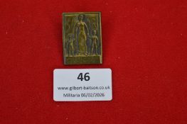 German patriotic relief badge, rectangular bronze-toned example depicting a mother flanked by two