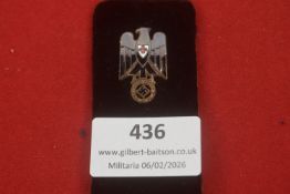 Third Reich German Red Cross (DRK) Enamel Badge, featuring a grey eagle surmounted by a shield