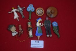 A mixed group of German WHW carved wooden figures and small toys, depicting men, women and