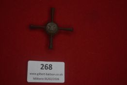 German veterans’ or commemorative badge in the form of a blackened cross with circular central