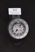 Suunto wrist compass, circular liquid-filled compass with rotating bezel graduated in degrees,