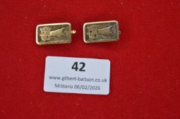 Pair of German patriotic cufflinks, rectangular gilt-brass examples each depicting shield with